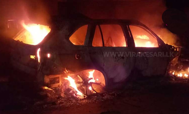 பிரமிட் திட்டத்தை நடத்தியவரின் சொகுசு கார் பணம் வைப்பிலிட்டவர்களால் தீ வைத்து எரிப்பு!